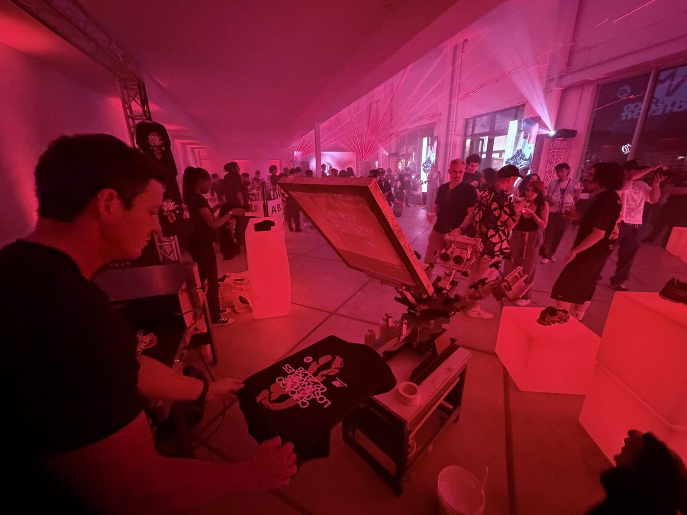 Merch Troop live screen-printing station running at a Austin event